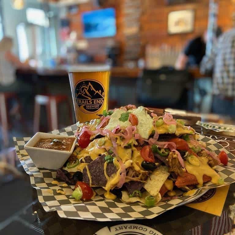 **NEW** BEER CHEESE NACHOS !! Blue corn chips with Alex’s House made BEER CHEESE lay…