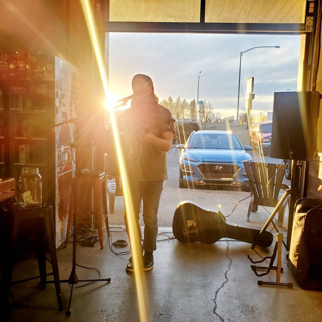 Sun’s out, roll-up door is open and Jonathan Tibbetts has an amazing voice! Come